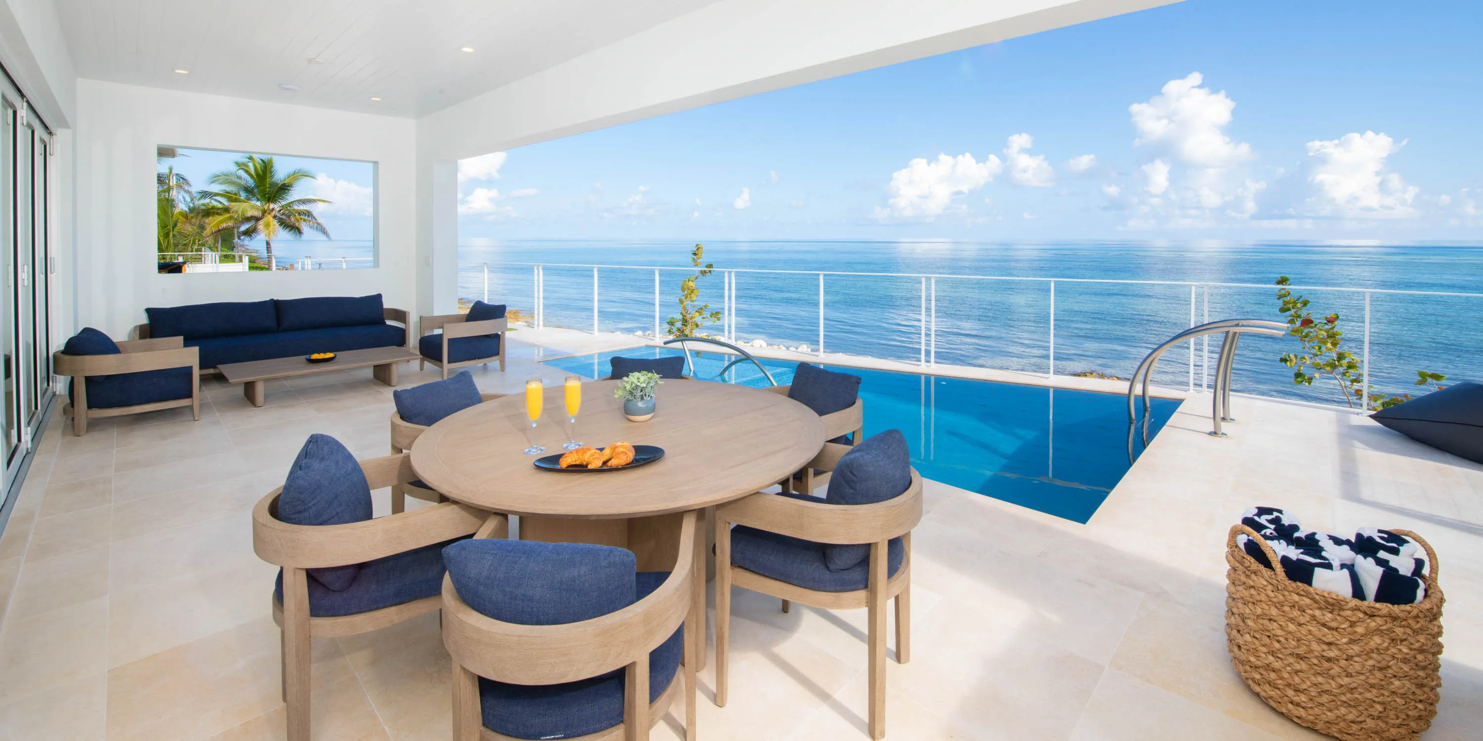 Willow Beach — outdoor living and pool area — luxury villa in Grand Cayman